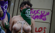 (EDITOR'S NOTE: Image contains nudity.) Feminist groups from all over the city gather in a...