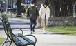 Tourists are seen wearing protective face masks while walking around Krakow, Poland on Mar...