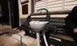 St. John's Hospice rigged a handwashing station outside of their facility to provide unhou...