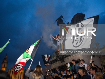 Juventus supporter  rejoice on 2nd May in S. Carlo Square of Turin, Italy,  for   winning   the italian league with 4 match in advance. (