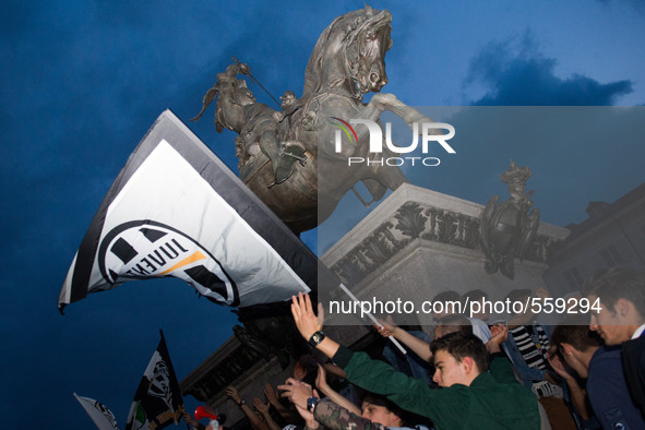 Juventus supporter  rejoice on 2nd May in S. Carlo Square of Turin, Italy,  for   winning   the italian league with 4 match in advance. 