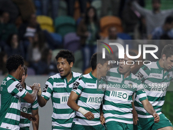 Sporting players celebrating the goal scored by Sporting's Colombian forward Fredy Montero (3rd R) during the Portuguese League football mat...