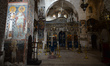 Frescoes on walls and pillars seen inside the Monastery of the Cross, an Eastern Orthodox...