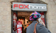 A lady passes in front of FOX home shop in Jerusalem's City Center. On Wednesday, March 1...