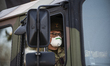 Military personnel leave the churches from Bergamo to carry coffins of coronavirus (COVID-...