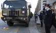 Military personnel leave the churches from Bergamo to carry coffins of coronavirus (COVID-...