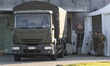 Military personnel leave the churches from Bergamo to carry coffins of coronavirus (COVID-...