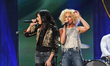 Singers Karen Fairchild (L) and Kimberly Schlapman of Little Big Town perform onstage duri...