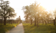 People walk during the afternoon sunset in Stuttgart, Germany on April 9, 2020 