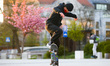 A boy wears a protective face mask due to the spread of coronavirus, while skateboarding....