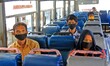  Migrant workers sit in a specially arranged Rajasthan Roadways bus to go back their home...