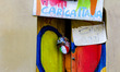 A man shows up in his shop with a mask in the colours of the Italian flag is seen in Navig...
