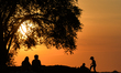 People enjoying a sunset view near Krakus Mound in Krakow-Podgorze.Since the 20th of Apri...