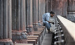 A Muslim man performs abolution inside closed Grand Mosque of Delhi Jama Masjid on the fir...