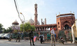 Indian forces stand outside to force shutdown of Grand Mosque of Delhi Jama Masjid on the...