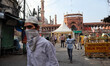 Muslims walk besides the closed Grand Mosque of Delhi Jama Masjid on the first day of Rama...