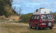 Red Volkswagen Transporter T4 (VW T4) Westfalia edition camper van with a bike rack on bac...