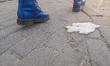Used medical disposable glove laying on the pavement is seen in Gdansk, Poland on 26 April...