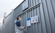 An employee of Italian automobile manufacturer FCA reads carefully a health information le...