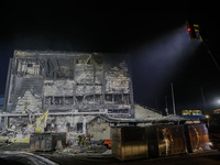 Firefighters carry out a search and rescue operation at the site of a fire that broke out at a warehouse construction site in Icheon, Gyeong...