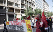 People wearing mask protest on International Worker's Day during the curfew due to Coronav...