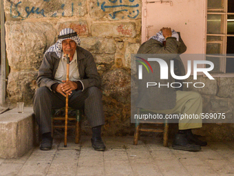Old men resting in the shadow in Hebron, Palestine, May 6th 2015.  (