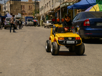 A child is playing with his car in Hebron, Palestine, May 6th 2015.  (