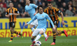 David Silva of Manchester City and Jake Livermore of Hull City during the Premier League m...