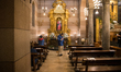 People pray in church in the first day when religious services are allowed again in Turin...