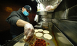 A view of taco Vendor in Woodside during the coronavirus pandemic on May 18, 2020 in Borou...