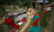 People are drying clothes in a village of Sindhupal Chowk, Nepal. May 7, 2015. 