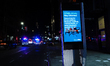 Digital poster are seen vandalized by protestors as they rally against the death of Minnea...