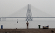 A police officer stands guard at a beach in Mumbai, India on June 02, 2020. Tropical cyclo...
