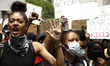 Protesters demonstrate in the streets of Manhattan in response to the death of a Minneapol...