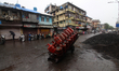 liquid petroleum gas (LPG) cylinders are seen on a wooden cart in Mumbai, India on June 03...