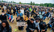 People are taking a knee, during the second massive Black Lives Matter protest that took p...