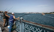 People walk in Istanbul, Turkey, on June 10, 2020 in the second week of easing coronavirus...