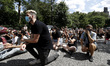 Hundreds of demonstrators walk to Gracie Mansion, the official residence of the Mayor of N...