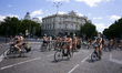 (EDITOR'S NOTE: Image contains nudity.)   Naked cyclists on bicycles in the middle of Madr...
