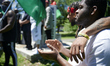Hundreds take part in a Black Men Rising march and rally to protest police brutality, equa...