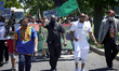 Community members take part in a Black Lives Matter protest, organized by Black Men Rising...