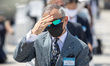 US Ambassador to South Korea Harry Harris wipe the sweat of the face with his hands during...