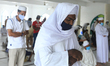 Sri Lankan Muslim devotees wearing face masks pray by keeping social distance inside a mos...