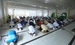 Sri Lankan Muslim devotees wearing face masks pray by keeping social distance inside a mos...