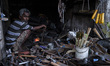 A shopkeeper is waiting for his customers during COVID-19 situation on June 22, 2020 in Ko...