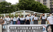 College students hold a rally in front of the Seoul government complex demand that the gov...