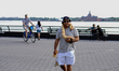 A person with his pet snakes is seen as Manhattan enters Phase 2 of re-opening following r...