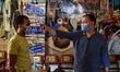 A customer gets his temperature measured by a worker in a cafe in Cairo Cafes and restaura...