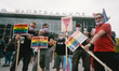 Participants of the ''Pride demo in Cologne'' parade through the city with flags and poste...