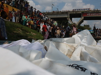 Rescuer workers recovered bodies of victims after a ferry capsized at Sadarghat Launch terminal in Dhaka, Bangladesh on June 29, 2020. At le...